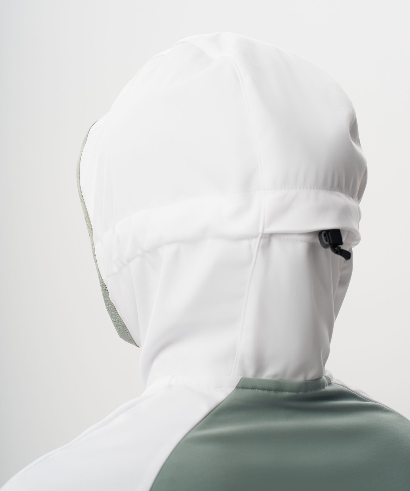Тренировочная куртка Nordski PRO TOUR HOOD White/Dark Mint/Ice Mint W